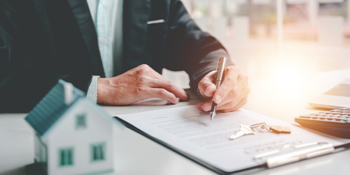 Image of an appraiser doing paperwork.